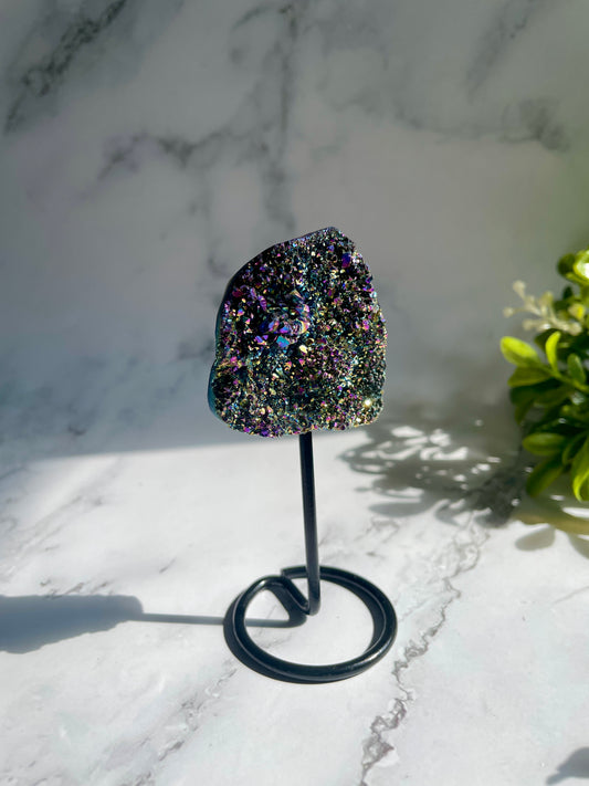 Titanium Rainbow Aura Quartz On A Metal Stand